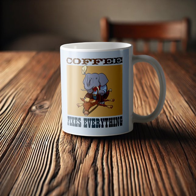 Der Kaffee repariert alles Elefantenstockpferd Kaffeetasse (Von Creator hochgeladen)