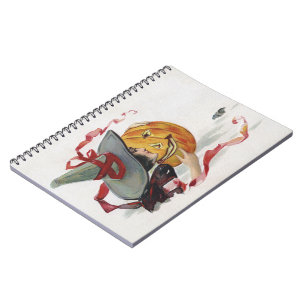 Der Kuss der Hexe: Ein Kürbislaterne an Halloween Notizblock