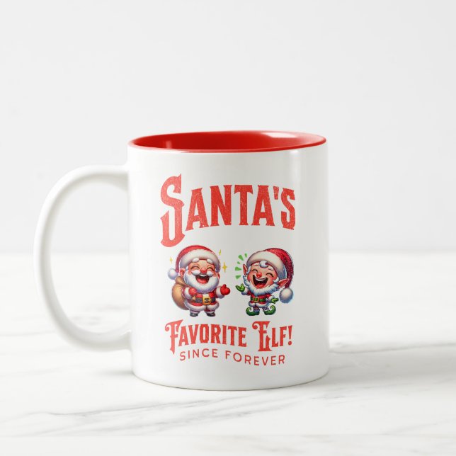 Der Lieblingself des Weihnachtsmanns seit jeher Zweifarbige Tasse (Links)