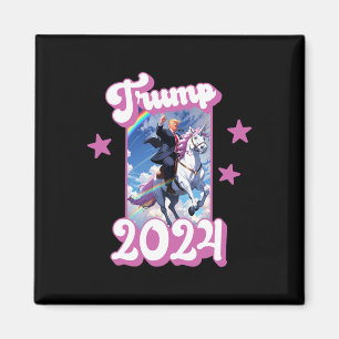 Der lustige Donald Trump reitet ein Einhorn. Pink Magnet