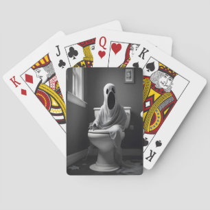 Der lustige Geist sitzt auf der Toilette Spielkarten
