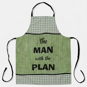 Der Mann mit Plan Green und Gingham Karo Schürze