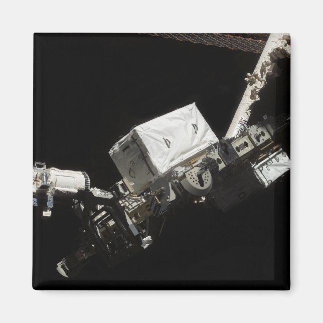 Der Roboterarm des Remote Manipulators System Magnet (Vorne)