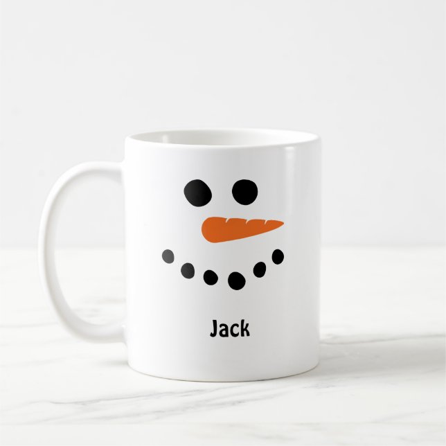 Der Schneemann steht vor der Tasse. Personalisiere Kaffeetasse (Links)