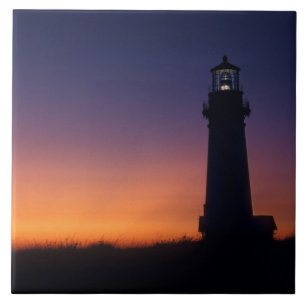 Der Sonnenball fällt auf den bunten Horizont Fliese