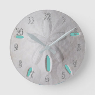 Der Strand des Sand-Dollar-Ozeans ist türkisblau Runde Wanduhr