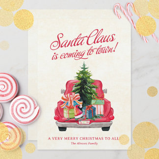 Der Vintage rote LKW des Weihnachtsmanns mit Urlau Feiertagskarte