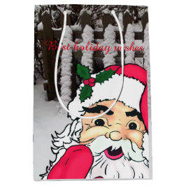 Der Weihnachtsmann auf einem Schneeballzaun Mittlere Geschenktüte