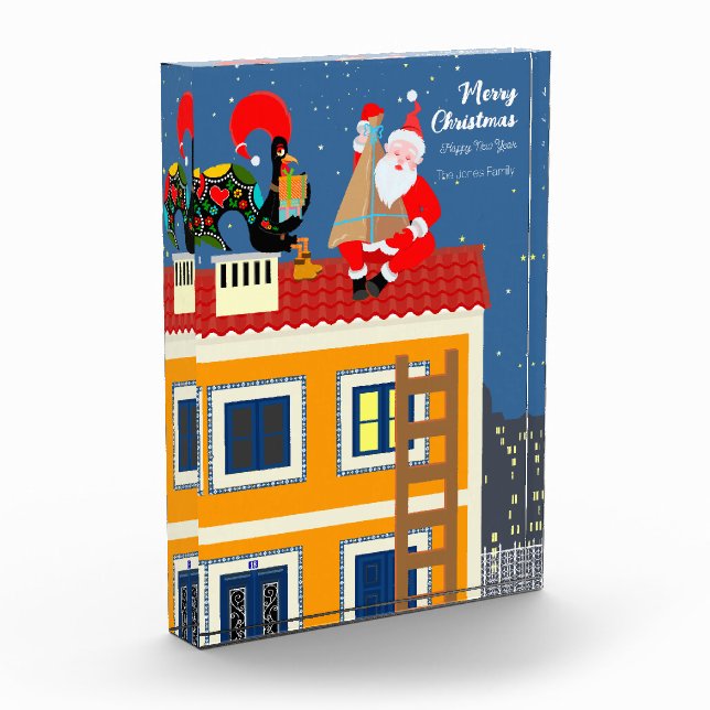 Der Weihnachtsmann trifft auf das portugiesische R Fotoblock (Links)