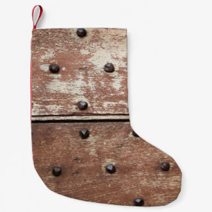 Detail einer alten bemalten schäbigen Tür mit rost Kleiner Weihnachtsstrumpf