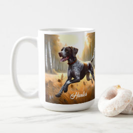 Deutscher Kurzzeitpointer läuft Kaffeetasse
