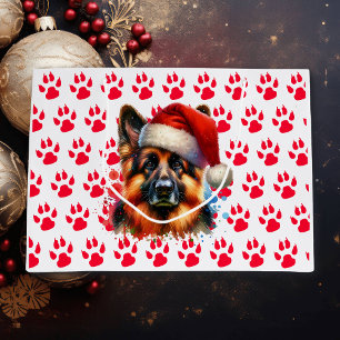 Deutscher Schäferhund in der Weihnachtsmannmütze W Große Geschenktüte