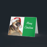 Deutscher Schäferhund mit einem Weihnachtshut Feiertagskarte<br><div class="desc">Ein Niedlicher deutscher Hirte, der zu Weihnachten einen Weihnachtshut trägt</div>