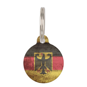 Deutschland-Flagge auf altem hölzernem Korn Haustiermarke