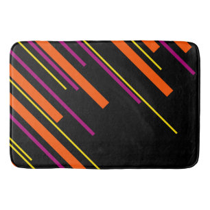 Diagonalen - schwarz, rosa, orange und gelb badematte
