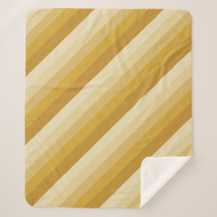 Diagonalstreifen in Goldtönen Sherpadecke