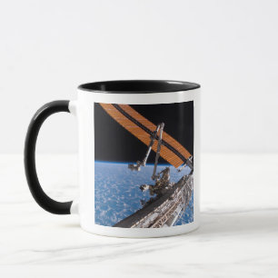 Die Canadarm2 und Solarstromanlageplattenflügel Tasse