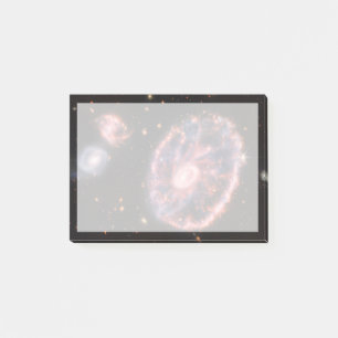 Die Cartwheel Galaxie und ihre Begleitgalaxien. Post-it Klebezettel