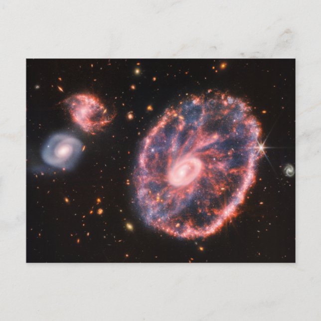 Die Cartwheel Galaxie und ihre Begleitgalaxien. Postkarte (Vorderseite)