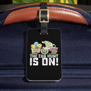 Die Eierjagd ist an sonnigen Ostern. Gepäckanhänger