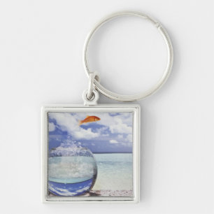 Die Fische springend vom Aquarium Schlüsselanhänger