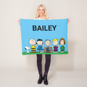 Die Freunde von Erdnüssen in einer Reihe Fleecedecke