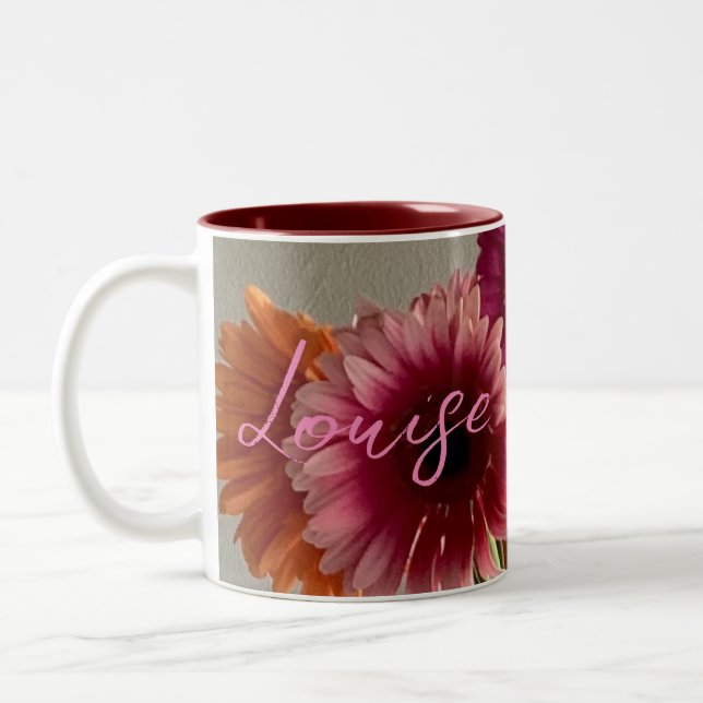 Die fröhliche Gerbera Blume + Individuelle Name Zweifarbige Tasse (Links)