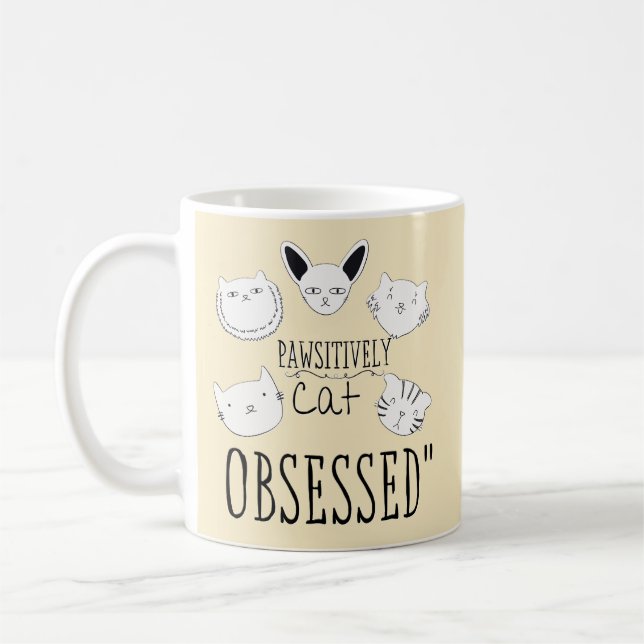 Die "glückliche Katze besessen" Kaffeetasse (Links)