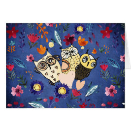 Die glückliche Vogeltierfamilie im Blumengarten