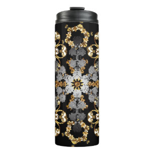 Die goldene Kontur ist mit Blumen dekoriert. Ostst Thermosbecher