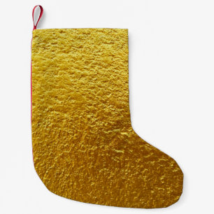 Die goldene Wandtextur ist abstrakt, alt, antike Kleiner Weihnachtsstrumpf