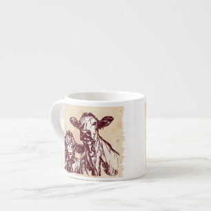 Die Hand mit zwei Kühen zeichnen die Skizze u. Espressotasse