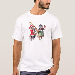 Die Katze legt die Knochen im Schnee T-Shirt