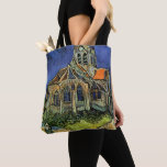 Die Kirche in Auvers von Vincent van Gogh<br><div class="desc">Die Kirche von Auvers (1890) von Vincent van Gogh ist ein Vintager Post-Impressionismus feiner Kunst architektonische religiöse Malerei. Eine Frau, die auf einem Weg zur Dorfkapelle spaziert, mit schönen Buntglasfenstern. Eine Szene der Alltagsarchitektur. Über den Künstler: Vincent Willem van Gogh (1853-1890) war ein postimpressionistischer Maler, dessen Werk besonders für seine...</div>