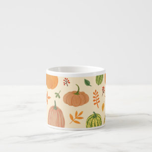 Die Kürbis sind grün und orange, das Muster ist na Espressotasse