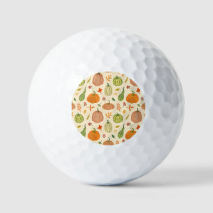 Die Kürbis sind grün und orange, das Muster ist na Golfball