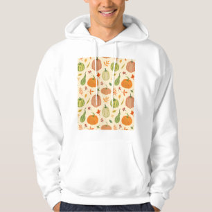 Die Kürbis sind grün und orange, das Muster ist na Hoodie