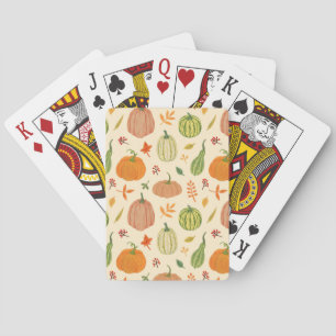 Die Kürbis sind grün und orange, das Muster ist na Spielkarten