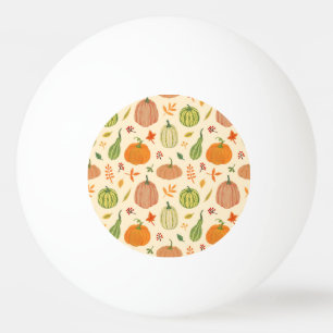 Die Kürbis sind grün und orange, das Muster ist na Tischtennisball