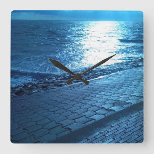 Die Meeresküste, die Ruhe und das blaue Foto Quadratische Wanduhr