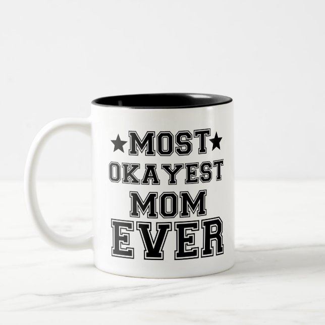 DIE MEISTEN OKAYEST-MAMAS JE ZWEIFARBIGE TASSE (Links)