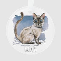 Die niedliche siamesische Katze, die | malt,