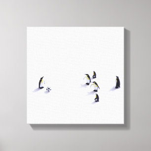 Die Pinguine beim Fußballspielen Leinwanddruck