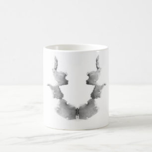 Die Rorschach Test-Tinte befleckt Kopf-Gesichter Tasse