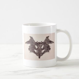 Die Rorschach Test-Tinte befleckt Schläger der Tasse