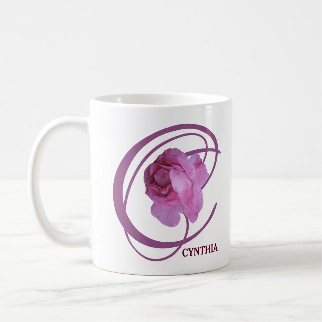 Die rosa Rosa Blume aus Cynthia, die sich an den T Kaffeetasse (Links)