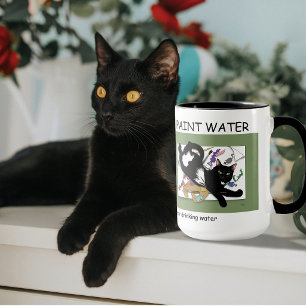 Die schwarze Katze des Künstlers Tasse