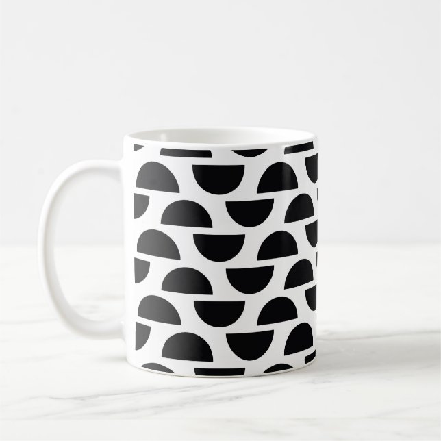 Die schwarzen Hälften des Kreises schaffen einen e Kaffeetasse (Links)