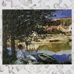 Die Seine-Bank, Bennecourt von Claude Monet Puzzle<br><div class="desc">An der Seine-Ufer, Bennecourt (1869) von Claude Monet ist ein Vintager Impressionismus Kunst Natur Malerei. Ein Porträt einer Frau, die unter einem schattigen Baum am Ufer der Seine sitzt. Sie sitzt neben Booten und Robotern mit Gebäude auf der anderen Seite des Wassers. Über den Künstler: Claude Monet (1840-1926) war Gründer...</div>