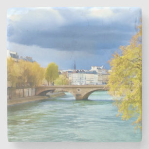 Die Seine unter April-Himmeln Steinuntersetzer
